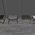 Four Modern Stools With Varied Designs On Gray Wooden Floor Against Dark Wall