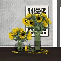 Bright Yellow Sunflowers In Glass Vases With Scattered Petals On Table And Decorative Wall