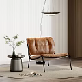 Modern Brown Leather Leisure Chair In Minimalist Interior With Small Side Table And Green Plant