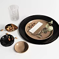 Modern Black And Beige Tableware Set With Plates Bowls Glass Leaves Nuts On Dining Table