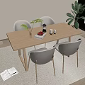Modern Light Wood Table And Chair Set With Gray Seats And Plant On Rug