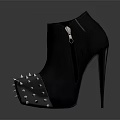 Edgy Black Boots With Spiked Metal Sole And Contemporary Fashion Design