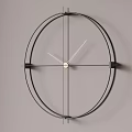 Modern Minimalist Metal Frame Wall Clock Hanging On Gray Wall With Simple Design