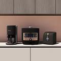 Modern Black And Gray Kitchen Appliances On Countertop Including Coffee Maker Pressure Cooker And Toaster