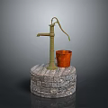 Green Hand Water Pump With Orange Bucket On Stone Base