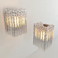 Unique-shaped Transparent Pendant Lights With Vertical Striped Texture Illuminated In Modern Interior 3d model