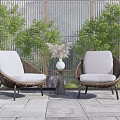 Outdoor Rattan Casual Sofa Set With Two Chairs Small Table Vase And Green Plants