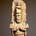 Ancient Stone Sculpture Carving With Intricate Historical Figure Details And Robes Design