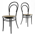 Classic Single Chair With Black Metal Frame And Rattan Seat Design