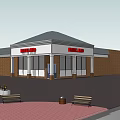Commercial Complex Building Exterior With Red Signage Glass Windows And Benches