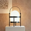 Modern Table Lamp With Black Metal Frame And White Round Lampshade On White Base