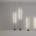 Illuminated Long Strip Lighting Fixtures Hanging And Floor Standing With Black Base In White Room
