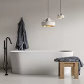 White Bathtub With Black Faucet Hanging Gray Towel Two Pendant Lights And Wooden Stool