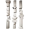 Abstract White Sculptures With Stacked Geometric Shapes And Vertical Design