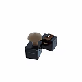Stylish Riveted Bedside Tables With Golden Table Lamp Books And Small Bottles