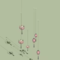 Pink Lotus Shaped Multiple Hanging Pendant Lights Against Light Blue Background