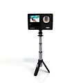 Electronic Monitor Device With Display Screen And Camera Lens On Tripod Stand