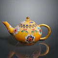 Decorative Yellow Teapot With Vibrant Floral Patterns And Golden Handle Spout