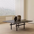 Modern Black Coffee Table With Ceramic Vase Sculpture And Book By Window With Blinds