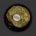Delicious Round Chocolate With Golden Foil Wrapping And Label On Brown Paper Cup