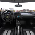 Lotus White Sports Car With Black Roof Sleek Design And Aerodynamic Features