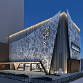 Modern Commercial Complex With Unique Patterned Facade And Illuminated Design At Night 3d model