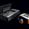 Victory Black Portable Tape Recorder with Cassette Tape and Orange Earmuff Headphones