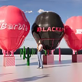 Giant Red And Black Balloons With Barbie Black And Summer Designs Surrounded By Cactus Decorations
