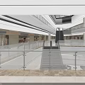 Shopping Mall Atrium With Glass Skylight Blue Sky White Clouds Multiple Floors Glass Railings Shops