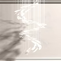 Elegant White Feather Chandelier with Hanging Plumes and Soft Light Shadows