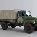 Military Green Truck with Canvas Covered Cargo Bed and Off-Road Exterior Design