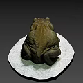 Realistic Brown Frog Statue On White Circular Base With Detailed Texture