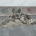 Pile of Stones and Wood Construction Materials Against Graffiti Wall Background