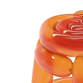 Stylish Orange Balloon Like Stool With Glossy Curved Design For Modern Interior