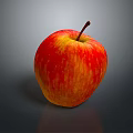 Fresh Red and Yellow Striped Apple With Stem on Dark Background Showing Reflection