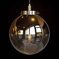 Spherical Glass Globe Chandelier With Metallic Finish And Interior Reflections Wooden Ceiling And Window Light