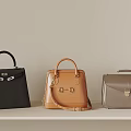 Elegant Handbags Display With Black Brown Gray Hues And Classic Buckle Accents