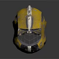 Worn Yellow Metal Weapon Helmet With Protective Design And Scratched Surface