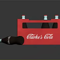 Red Clarke's Cola Crate Display With Glass Bottles And Spilled Bottle