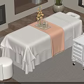 Cozy Massage Table Setup With White Sheets and Mobile Trolley in Elegant Indoor Spa Room