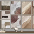 Abstract Art Paintings with Neutral Tones on Wall and Decorative Shelf with Vases