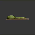 Fresh Avocado Whole and Sliced with Lime on Wooden Cutting Board