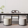 Modern Tea Table with Beige Stools Tea Set and Potted Plant in Minimalist Design