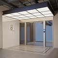 Facade Entrance Area With Elevator Doors Overhead Lighting Light Stone Tiles And Number 8 Signage