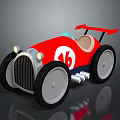 Red Toy Race Car With Number 16 Large Black Wheels Rear Spoiler And Driver Seat