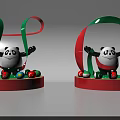 Panda Figurines With Raised Arms On Red Circular Base And Colorful Balls Green Red Ribbons