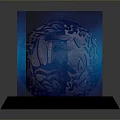 Silver Sphere with Intricate Patterns and Blue Cubes on Black Base with Reflections