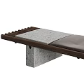Public Bench With Wooden Slats Concrete Supports And Gray Cushions