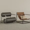 Modern Single Chairs With Metal Frame Cylindrical Design Brown Beige Cushion On Gray Carpet