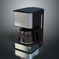 Sleek Modern Black And Silver Coffee Maker With Stainless Steel Body And Glass Carafe